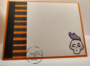 Inside of Cute Halloween Card, showing a skull with a raven sitting on top