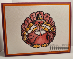 Card showing a maroon and orange turkey wearing a gray pilgrim's hat