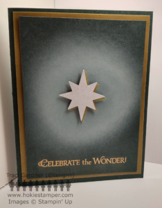 Christmas card featuring the Christmas Star with a glowing aura on a dark green front, with the sentiment Celebrate the Wonder!