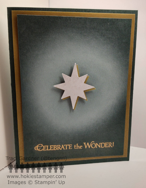 Chrismas card featuring the Nativity Star with a glowing aura on a dark green front, with the sentiment Celebrate the Wonder!