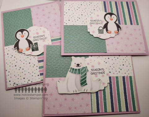 Three Christmas cards featuring four rectangles of patterned paper in greens, white, and purple. The cards feature a penguin or a polar bear and the sentiment Season's Greetings.