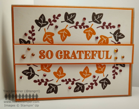 Thanksgiving Oval Wreath card with orange, green, and brown leaves, with the sentiment So Grateful