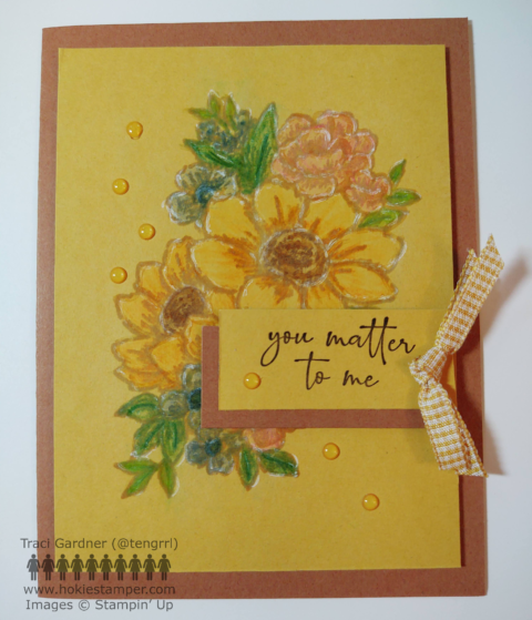 Yellow and brown card featuring flowers shaded in blue, yellow, and pink, with the sentiment, You matter to me