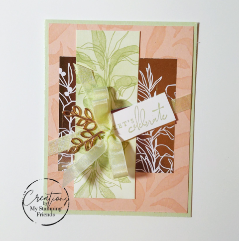 Greeting card featuring layers of peach, green, and copper foil, all showing leaves and foliage. The card includes a soft green bow, gold leaves embellishments, and the sentiment, Let’s celebrate