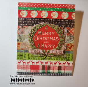 Christmas card showing stripes of washi tape as the background, featuring plaids, holly, snowflakes, and Santa's face. A vintage Christmas wreath is centered over the background. It has the sentiment A Merry Christmas and a Happy New Year