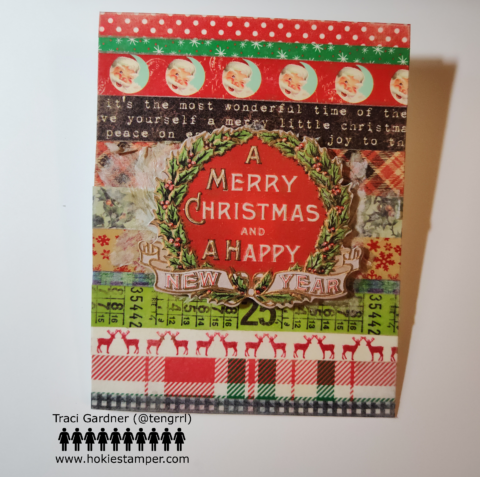 Christmas card showing stripes of washi tape as the background, featuring plaids, holly, snowflakes, and Santa's face. A vintage Christmas wreath is centered over the background. It has the sentiment A Merry Christmas and a Happy New Year