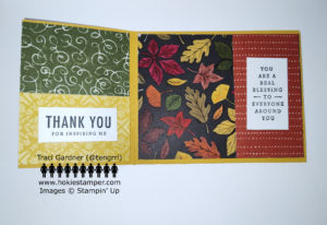 Thanksgiving card with front flap open to show colorful fall leaves, , and green and yellow backgrounds of patterned paper. The sentiment on the left states, Thank you for inspiring me.