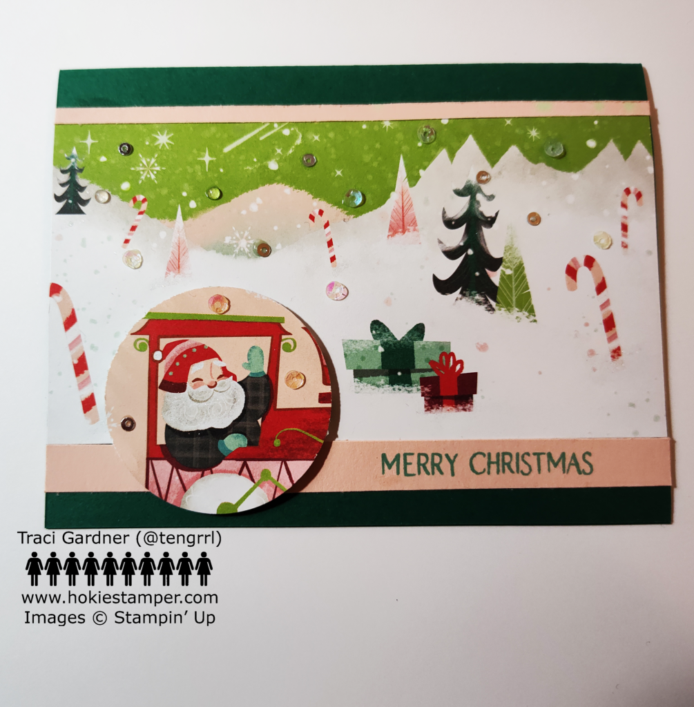 Christmas cards showing a winter scene with Santa in a train engine and the sentiment Merry Christmas