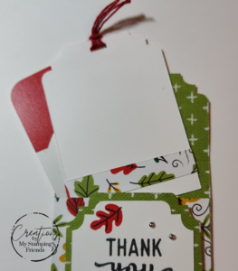 Inside of fall gift card holder, showing pull-out tag where sender can write a greeting.