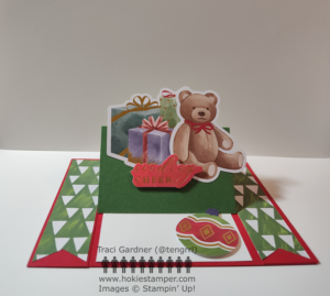 Easel Christmas card featuring colorful, wrapped presents and a teddy bear with the sentiment Sending Cheer