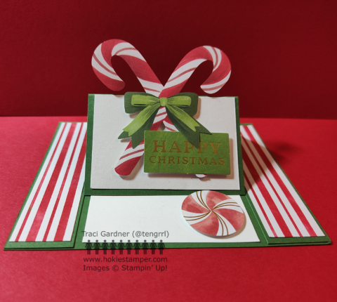 Easel Christmas card with crossed candy canes tied with a green bow and the sentiment Happy Christmas