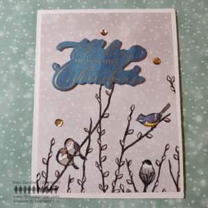Two birds on a snowy background with the sentiment, Thinking of you this Christmas